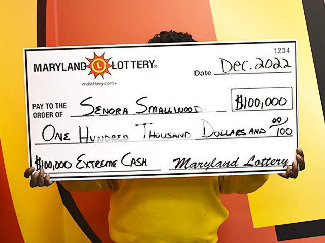 Photo shows the cheque of Senora Smallwood, undated photo. Senora Smallwood, a woman from Silver Spring, Maryland, U. S., won a USD 100,000 prize after playing the Extreme Cash scratch-off ticket she purchased at the Wheaton Exxon.  Note: Photo is from North Carolina Education Lottery (Maryland Lottery/Newsflash)