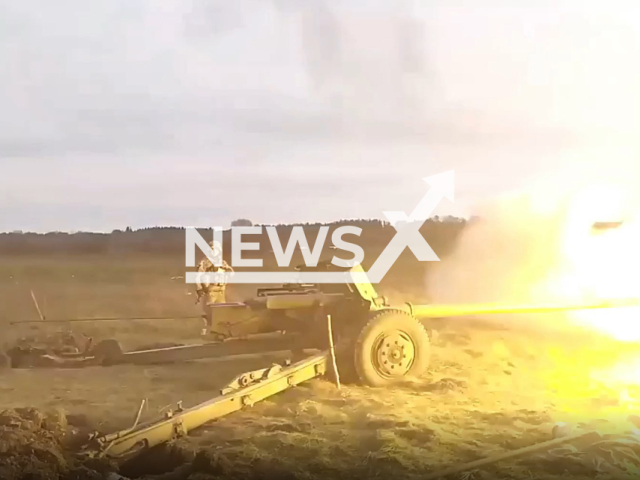 Ukrainian soldier shoots a howitzer during joint combat training in Volhynia, western Ukraine. The footage was obtained from the Western Territorial Administration of the National Guard of Ukraine on Wednesday, Dec. 7, 2022. Note: Photo is a screenshot from a video(@Lviv.ngu.west/Newsflash).