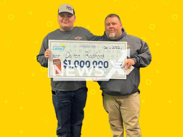 Dalton Radford, 18, (left) poses with unidentified man and   winning USD 1 million  scratch-off check. He said  that his grandfather predicted he’d win USD 1 million two weeks before his scratch-off win, in Dallas, North Carolina, USA. Note: Licensed photo.  (NC Lottery/Newsflash)