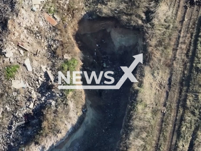 Picture shows Russian soldiers hiding in the ravine near Bakhmut, Donetsk region, Ukraine. The footage was obtained from the 71st separate jaeger brigade of the Airborne Assault Troops of the Armed Forces of Ukraine on Thursday, Dec. 8, 2022.Note: Picture is screenshot from a video (@71brigade/Newsflash).