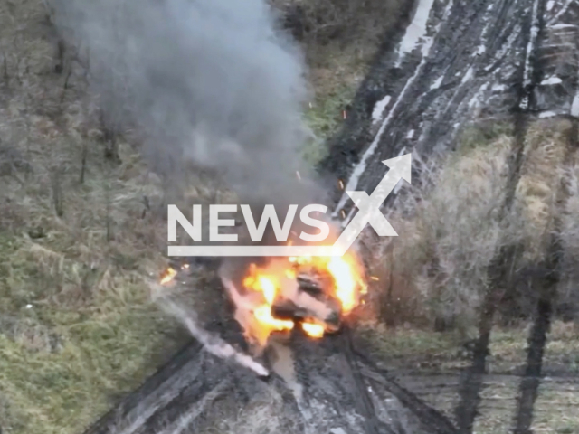 Picture shows burning Russian tank in the field in Ukraine. The footage was obtained from the 80th separate amphibious assault brigade of the Armed Forces of Ukraine on Thursday, Dec. 8, 2022. Note: Picture is screenshot from a video (@80brigade/Newsflash).