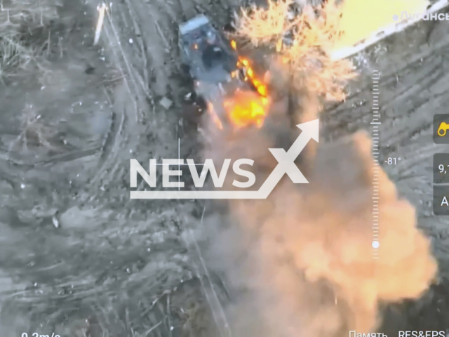 Picture shows burning Russian enemy armored personnel carrier in the residential area near Svatove, Luhansk region, Ukraine. The footage was relayed by the Office of Strategic Communications (StratCom) of the Armed Forces of Ukraine on Friday, Dec. 9, 2022. Note: Picture is a screenshot from a video (@khartiia/Newsflash)