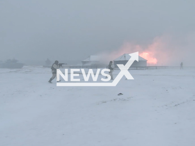 Russian soldiers practice assault on fortified areas in winter conditions in the training grounds of Republic of Belarus in Undated footage.
The footage was released by the Russian MoD on Monday, Dec. 12, 2022. Note: Picture is a screenshot from a video (Ministry of Defense of Russia/Newsflash)