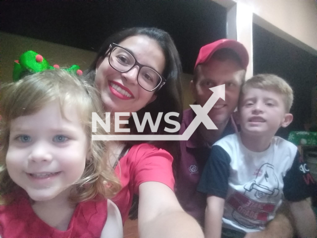 Sara, 4, (left) poses with her family in an undated photo. She reportedly died after drowning in a swimming pool in Sao Jose das Laranjeiras, Maracai, Sao Paulo, Brazil, Saturday, Dec. 10, 2022. Note: Picture is private (@anderson.gisele.10/Newsflash)