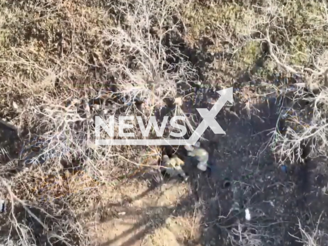 Fighters from the Ukrainian Mountain Assault battalion drop grenades on Russian troops in Ukraine in undated footage. 
The footage released by the Ground forces of the Armed Forces of Ukraine on Wednesday, Dec. 14. 2022.
Note: Picture is a screenshot from a video (108th separate mountain assault battalion/Newsflash)