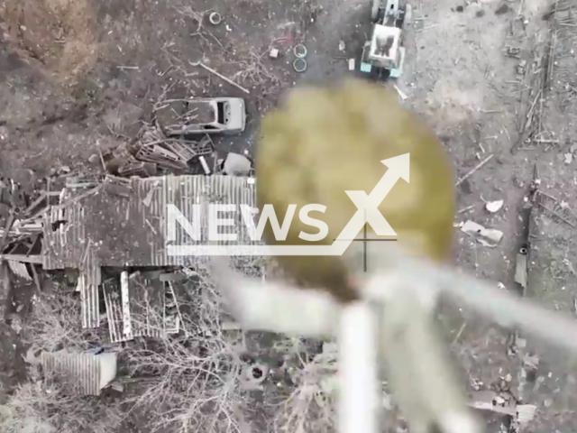 Drone drops an F-1 grenade into the chimney of the Russian occupiers with pinpoint accuracy in Ukraine in undated footage. The footage was released by the Office of Strategic Communications. on Wednesday, Dec. 14. 2022. Note: Picture is a screenshot from a video (@AFUStratCom/Newsflash)