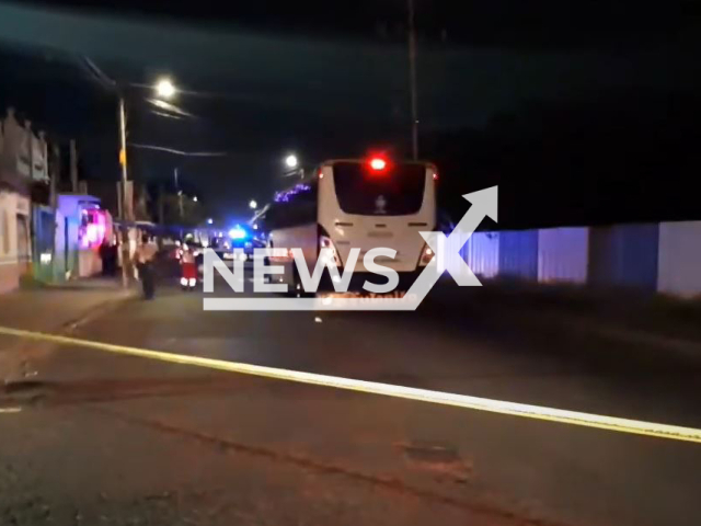 Pictures shows a bus and a police car at the scene of the accident, in Veracruz, Mexico, undated. A child, 7, who was traveling on a bus has died after sticking his head out the window and hitting a pole.
Note: Photo is a screenshot from a video. (Newsflash)