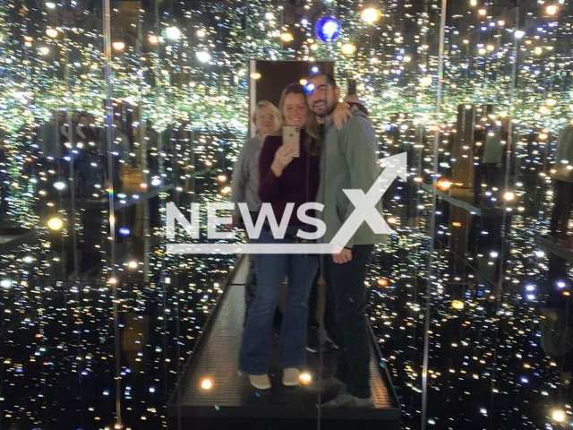 Jolene Bastian (middle) poses with her family inside an infinity mirror room in Los Angeles, California, in an undated photo. According to Jolene, it's dead silent inside the room. Note: We obtained permission for this photo. (Jolene Bastian/Newsflash)