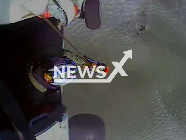 Coast Guard Air Station New Orleans MH-60T Jayhawk aircrew rescues three passengers from a downed helicopter in the Gulf of Mexico near Terrebonne Bay, Louisiana on Dec. 15, 2022. The three passengers were transported to the Houma-Terrebonne Airport to await medical services personnel in stable condition. Note: Photo is a screenshot from a video.(U.S. Coast Guard District 8 /Newsflash)