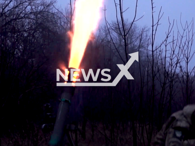 Ukrainian border guards fire with mortar at the Russian soldiers which were attempting to establish a foothold in a settlement in the Luhansk region in Ukraine in undated footage. The footage was released by the State Border Service of Ukraine on Tuesday, Dec. 20, 2022. Note: This picture is a screenshot from the video. (State Border Service of Ukraine/Newsflash)