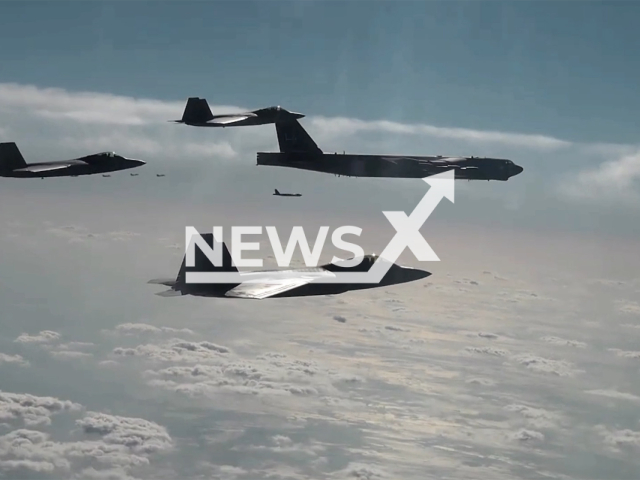 The footage shows the joint exercise of the US Air Force and the Republic of Korea that was conducted in the Korea Air Defense Identification Zone southwest of Jeju Island,  South Korea on  Tuesday, Dec. 20, 2022. U.S. Air Force F-22s stationed at Kadena Air Base in Japan deployed to Kunsan Air Base on December 20 (Tuesday), and will stay in Korea within this week to provide information on South Korean Air Force F-35As and North Korean nuclear and missile threats. Note: Photo is a screenshot from a video.(ROK Ministry of National Defense/Newsflash)