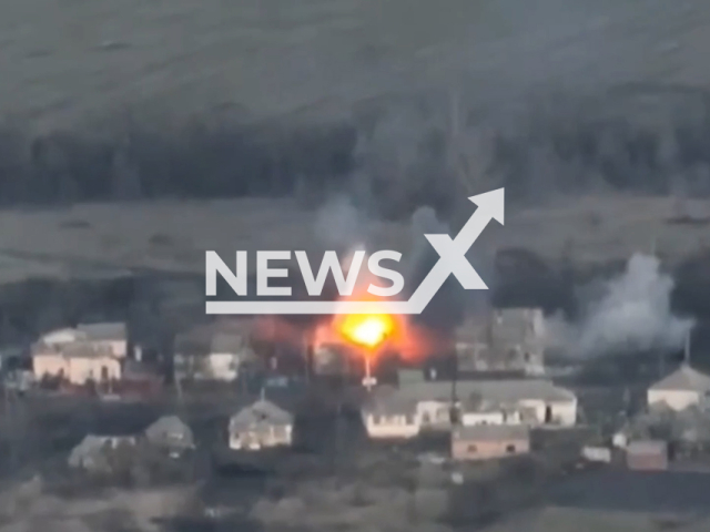 Picture shows an explosion in a residential area in Ukraine. The footage was obtained from the the Kastuś Kalinoŭski Regiment on Wednesday, Dec. 21, 2022. Note: Picture is screenshot from a video. (@belwarriors/Newsflash)