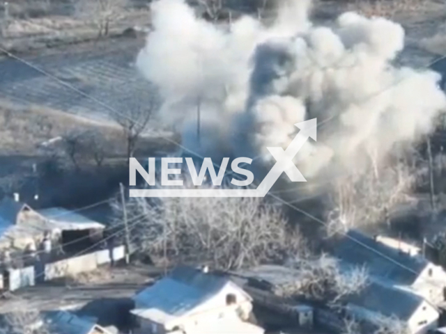 Picture shows an explosion in a residential area of Ozaryanivka, Donetsk region in Ukraine. The footage was obtained from the Territorial Defense Forces of the Armed Forces of Ukraine on Thursday, Dec. 22, 2022. Note: Picture is screenshot from a video. (@TerritorialDefenseForces/Newsflash)