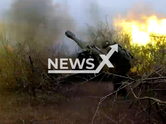 DPR artilleryman of the 3rd brigade shoots D-20 gun-howitzer near New York, Donetsk Oblast, Ukraine. The footage was obtained from the People's Militia of the DPR on Thursday, Dec. 22, 2022. Note: Picture is screenshot from a video. (@nm_dnr/Newsflash)