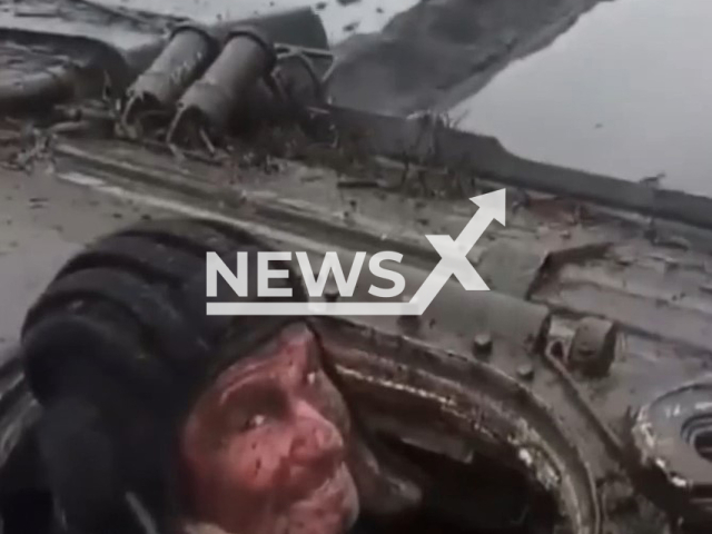 Ukrainian soldier moves on tank through mud on countryside battlefield in harsh weather conditions in Ukraine. The footage was obtained from the 92nd Ivan Sirko Separate Mechanized Brigade on Thursday, Dec. 22, 2022.Note: Picture is screenshot from a video. (@92OMBr/Newsflash)