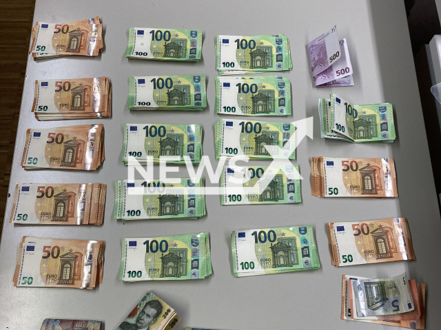 Image shows the cash which was found in a 38-year-old man's luggage, undated photo. Cops seized EUR 18,500 (GBP 16,000) and about 100 Reich banknotes from him on Sunday, Dec. 11, 2022. Note: Licensed content. (Polizeipraesidium Schwaben Sued, West/Newsflash)