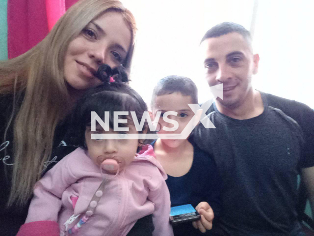 Police officer Franco Nicolas Cuello  poses with his wife and victim Valeria Ramirez, and their kids, undated. He accused his four-year-old son of taking his service weapon and accidentally murdering his mother, but the boy  gave a  statement that the his father killed his mom, in Godoy Cruz, Argentina.
Note: Private photo.  (Newsflash)