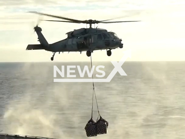 This footage shows the Nimitz-class aircraft carrier USS Abraham Lincoln conducting a vertical replenishment with dry cargo and ammunition ship USNS Richard E. Byrd, undated. Abraham Lincoln is underway conducting routine operations in the U.S. 3rd Fleet. Note: Picture is a screenshot from the video. (U.S. Navy/Newsflash)