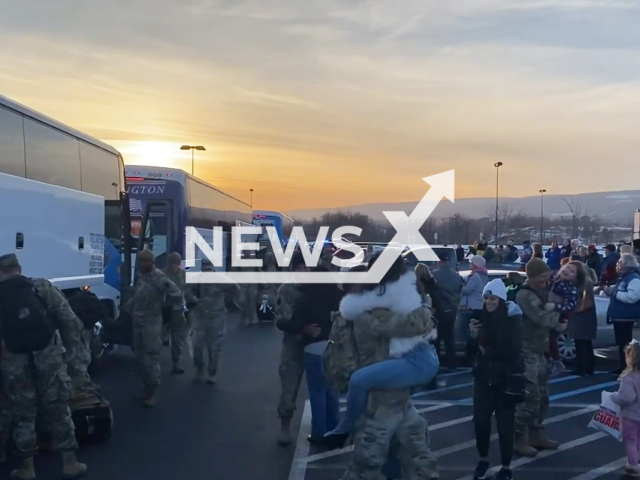 The footage shows the U.S. Soldiers with the 1st Battalion, 109th Infantry Regiment, 2nd Infantry Brigade Combat Team, and 28th Infantry Division arrive home in Pennsylvania, USA on  Wednesday, Dec.21, 2022. Note: The picture is a screenshot from the video (DVIDS/Newsflash)