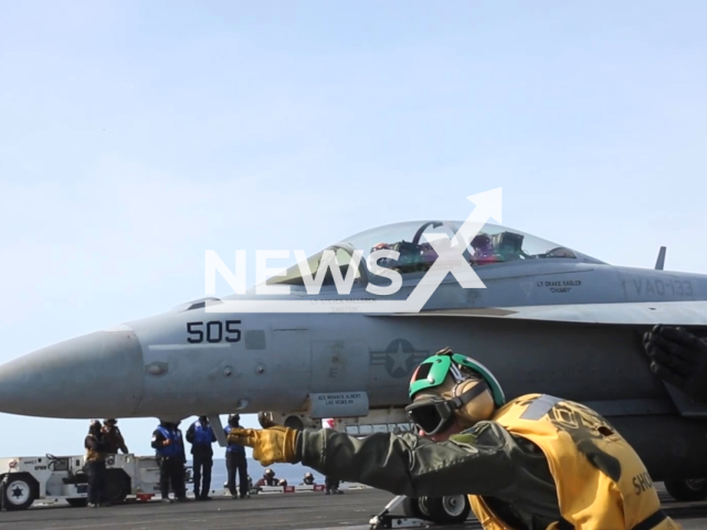 This footage shows the Nimitz-class aircraft carrier USS Abraham Lincoln conducting flight operations in a video shot on Friday, Dec. 2, 2022. Abraham Lincoln is underway conducting routine operations in the U.S. 3rd Fleet in the Pacific Ocean. Note: This picture is a screenshot from the video. (DVIDS/Newsflash)