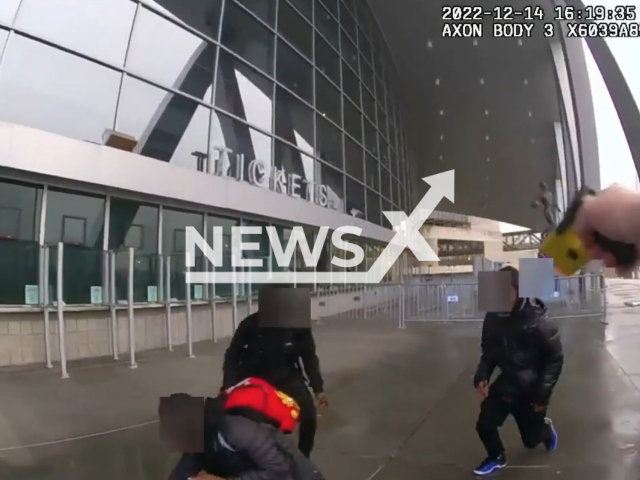 Police officer arrests  the group  of armed youngsters in Atlanta, Georgia, USA on Wednesday, Dec.14, 2022. Upon further investigation, all arrestees, who were juveniles, were charged. Note: Picture is a screenshot from the video. (City of Atlanta Police Department/Newsflash)