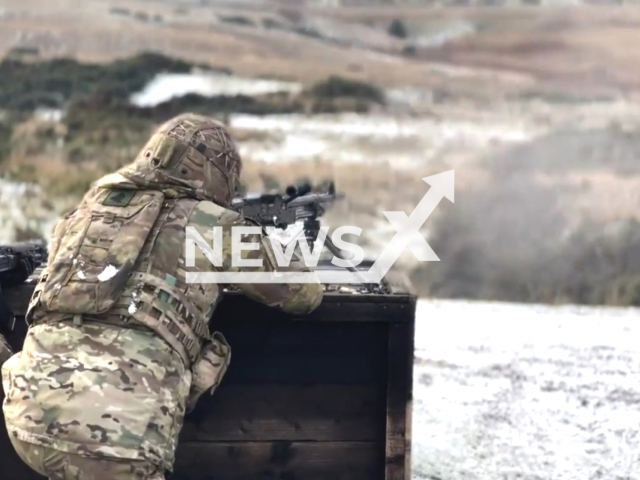 This footage shows Ukrainian recruits repelling an enemy advance on live fire tactical training in the snow with the British Army in the UK, undated. The exercise was part of Operation "INTERFLEX" which is a  British-led multinational military operation to train and support the Armed Forces of Ukraine. Note: This picture is a screenshot from the video. (Ministry of Defence/Newsflash)