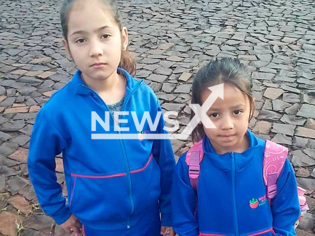 Emily and Kemily aged 5 and 8, pose in undated photo. Their bodies were found buried and with signs of violence in Novo Horizonte, Brazil, on Friday, Dec. 23, 2022, a day after their mother Neusa Maciel,  24, was found dead.
Note: Private photo.  (Newsflash)