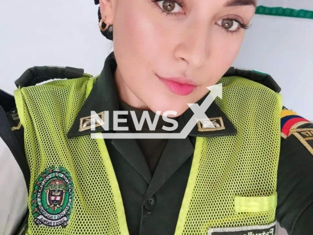 Police officer  Daniela Echeverry Gomez poses in undated photo. She  is being investigated for being allegedly involved in human trafficking in Cartagena, Colombia. Note: Private photo.  (Newsflash)