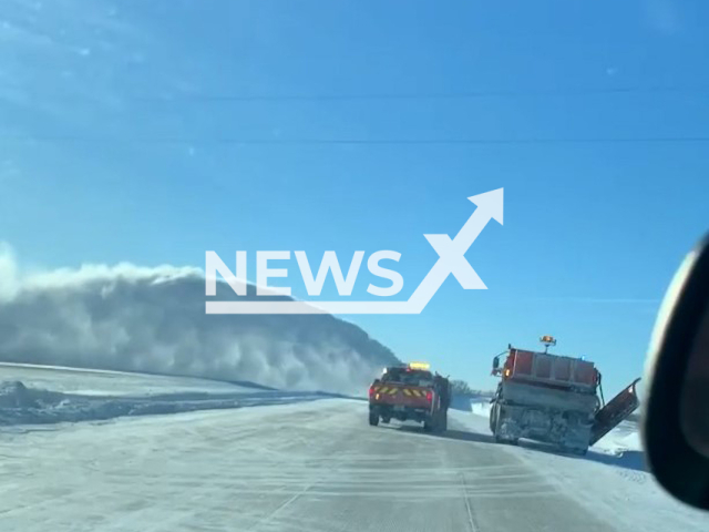 This footage shows Iowa State Patrol aiding giant lorries in the clearing of vast amounts of snow that piled up on the roads in Iowa, USA, undated. Note: Picture is screenshot from a video. (Iowa State Patrol/Newsflash)