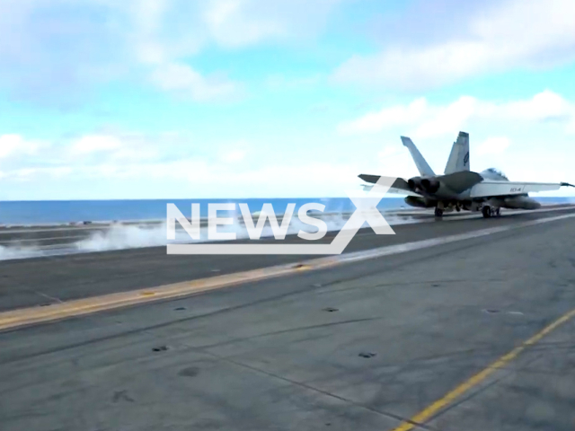 This footage shows the US Navy aircraft performing a series of takeoffs and landings aboard the Nimitz-class aircraft carrier USS Abraham Lincoln in the Pacific on Thursday, Dec. 1, 2022. USS Abraham Lincoln (CVN-72), named after the 16th president of America, is the fifth Nimitz-class nuclear-powered aircraft carrier in the US Navy and is a member of the US Pacific Fleet. Note: Picture is screenshot from a video. (U.S. Navy/Newsflash)