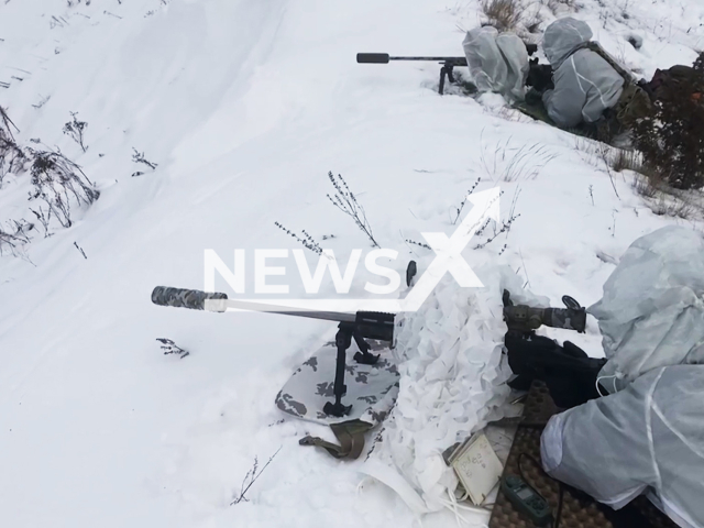 Picture shows snipers firring at the Belorussian training grounds in Belarus in undated footage.
The footage was released by the Russian MoD on Wednesday, Dec. 28, 2022. Note: This picture is a screenshot from the video. (Ministry of Defense of Russia/Newsflash)