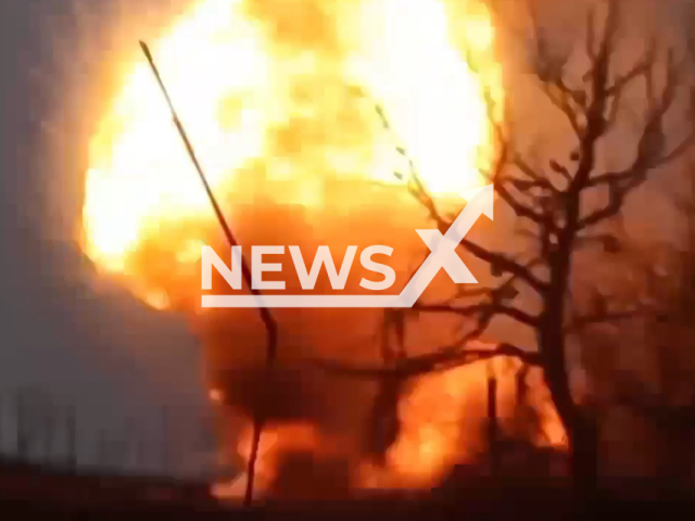 Russian tank explodes in a field area in Ukraine. The footage was obtained from the separate brigade of Territorial Defense of the city of Dnipro on Tuesday, Dec. 27, 2022. Note: Picture is a screenshot from a video (@BrTODnipro/Newsflash)