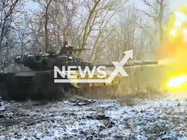 Russian T-80 tank fire at Ukrainian military positions in Ukraine in undated footage.
The footage was released by the Russian MoD on Thursday, Dec. 29, 2022. Note: This picture is a screenshot from the video. (@mod_russia/Newsflash)