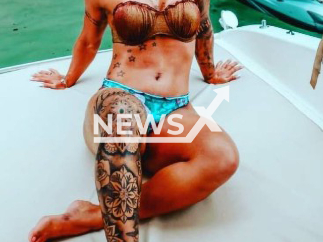 Andressa Christine Medeiros dos Santos, 33, was fired from the police for posting photos doing exercises and at social and fitness events while on sick leave, in Brazil.
Note: Private photo.  (Newsflash)