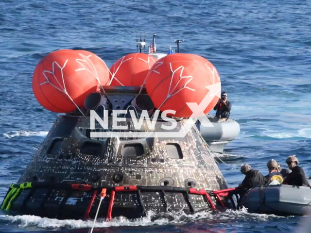 The footage shows the Orion spacecraft being recovered from the water after making a successful splashdown in the Pacific on Sunday, Dec. 11, 2022. The US 3rd Fleet accompanied the spacecraft as it was making its way home after spending  25.5 days in space, completing the Artemis I mission.  Note: This picture is a screenshot from the video. (U.S. Navy/Newsflash)