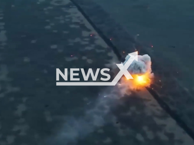 Ukrainian forces destroy Russian tanks and military equipment in huge blast on the battlefield in Ukraine in undated footage. The footage released by the Ground forces of the Armed Forces of Ukraine on Thursday, Dec. 29, 2022. Note: This picture is a screenshot from the video. (@59ompbr/Newsflash)