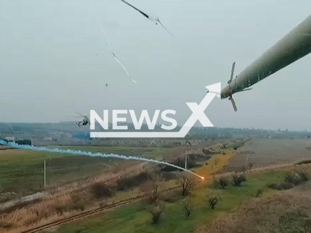 Ukrainian helicopters fire missiles at the Russian military positions in Ukraine in undated footage.
The footage released by the 18th separate army aviation brigade on Sunday, 31st Dec. 2022.
Note: This picture is a screenshot from the video.
(@18obraa/Newsflash)