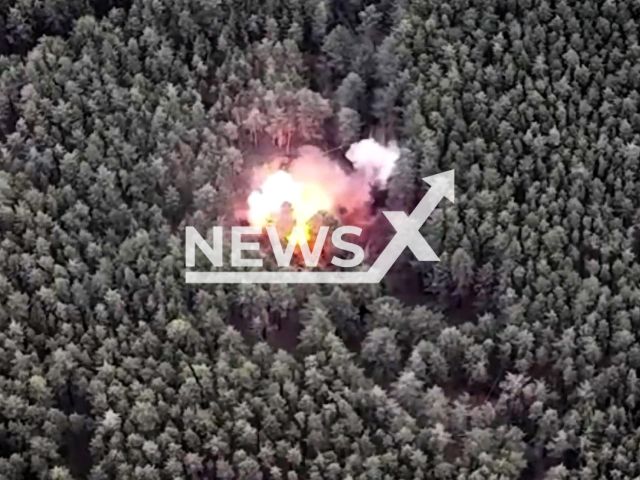 Ukrainian soldiers destroy Russian ammunition depot hidden in the forest in Ukraine in undated footage.
The footage released by the 3rd Separate Tank Iron Brigade on Monday, Jan. 2, 2023. Note: This picture is a screenshot from the video. (@Tretia.okrema.tankova.brygada/Newsflash)