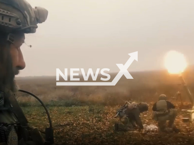 Fighters of pro-Ukrainian the Kastuś Kalinoŭski Regiment formed from Belarusian volunteers launch shells from mortar at Russian occupiers in Ukraine in undated footage. The footage was obtained from the Kastuś Kalinoŭski Regiment on Thursday, Jan. 5, 2023. Note: Picture is a screenshot from a video (@belwarriors/Newsflash)