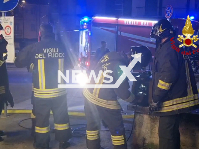 Teams of the Forli Fire Brigade extinguish a burning cellar in an apartment building in Forli, Italy, on Wednesday, Jan. 4, 2023. A thermal imaging camera was used to identify and battle each outbreak. Note: Photo is a screenshot from video (Vigili del Fuoco/Newsflash)