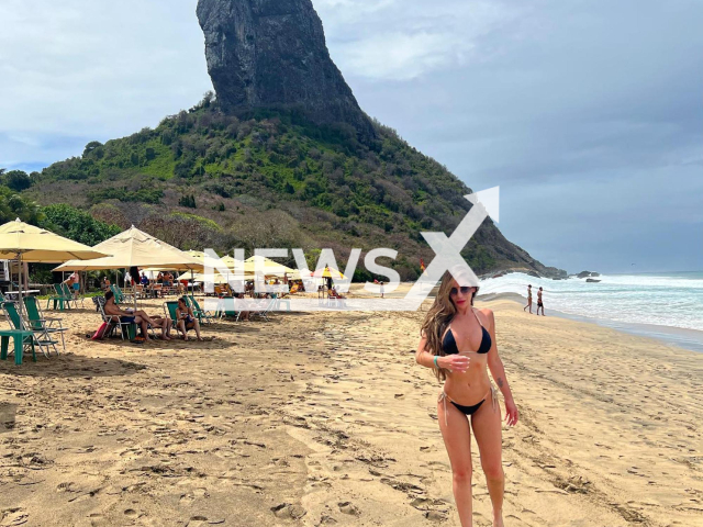 Photo shows Brazillian Anamara in a photo she allegedly used photoshop in an unsuccessful way and bent the sea, undated. She is reportedly a former Military Police. Note: Picture is private (@anamara/Newsflash)