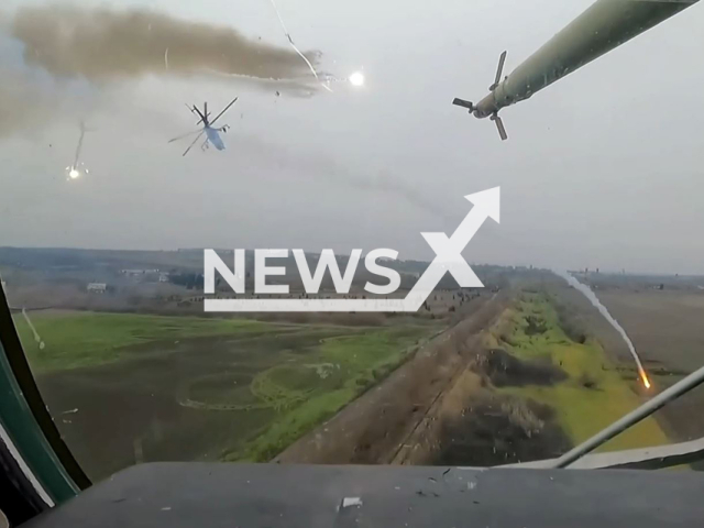 Ukrainian attack helicopters Мі-24 bombard Russian positions in Ukraine in undated footage. The footage was released by the 18th separate army aviation brigade on Monday, Jan. 9, 2023. Note: Picture is screenshot from a video (@18obraa/Newsflash).