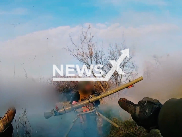 Fighters of the pro-Ukrainian legion "Freedom of Russia" formed from Russian volunteers shoot an anti-tank recoilless rifle at Russian positions in Ukraine in November, 2022. The footage was released by the legion "Freedom of Russia" on Monday, Jan. 9, 2023. Note: Picture is screenshot from a video (@legionoffreedom/Newsflash).