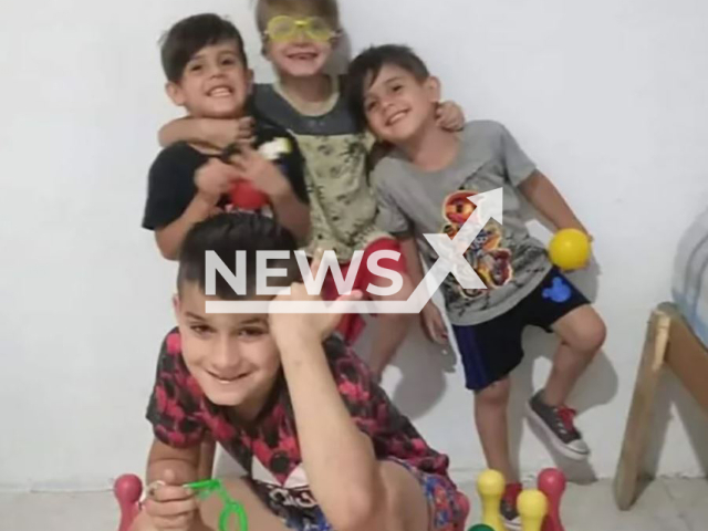 Brothers  Benicio and Noah Nisi , 4-year-old twins, Lorenzo del Rio, 6, and Santino Hardoy, 10, pose in unsated photo. The roof of their house collapsed killing them in Esteban Echeverria, Argentina, on Sunday, Jan. 8, 2022.
Note: Private photo.  (Newsflash)