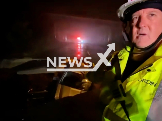 LAFD Batallion Chief, Andrew Wordin, explains the scene where a car had fallen in a growing sinkhole, in Chatsworth, Los Angeles, on Monday, Jan. 9, 2023. Firefighters had to make an immediate attempt to save the lives of the two people trapped. Note: Picture is screenshot from a video. (LAFD/Newsflash)