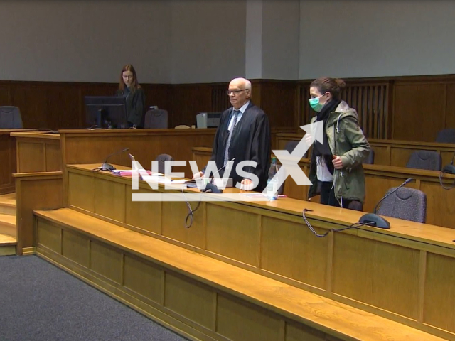 Image shows the 39-year-old mother in court, undated photo. She confessed she was sorry for throwing her two daughters off a balcony in the city of Saarbruecken, in Saarland, Germany, in July 2022. Note: Photo is a screenshot from a video. (Newsflash)