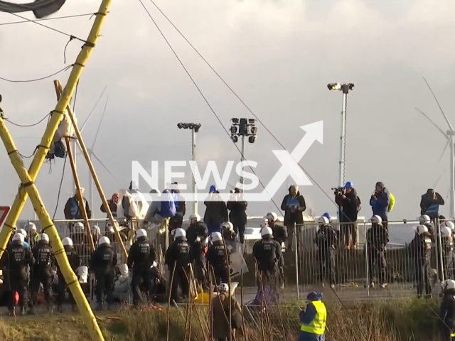 Image shows police officers and protestors in the village of Luetzerath, in North Rhine-Westphalia, Germany, undated photo. The cops started to clear climate activists away from the village in January 2023. Note: Photo is a screenshot from a video. (Newsflash)