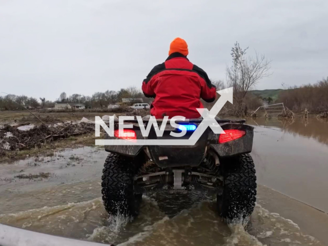 The San Benito County Search and Rescue teams rescue residents in flooded areas in California, USA, undated. Rescuers worked their way through flooded streets and thick mud to get to tough-to-reach places and aid animals in need. Note: Picture is a screenshot from a video. (San Benito County Search & Rescue/Newsflash)