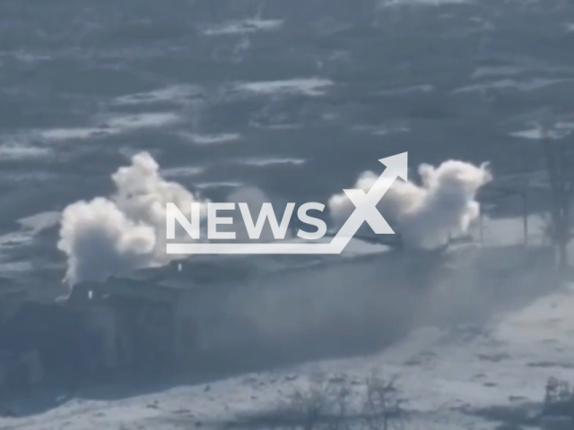 Picture shows an explosion of a building with two Russian soldiers hiding in it in Marinka, Donetsk region, Ukraine in undated footage. The footage was released by the 35th brigade of Ukrainian Navy on Thursday, Jan. 12, 2023. Note: Picture is a screenshot from a video. (@35obrmp/Newsflash)