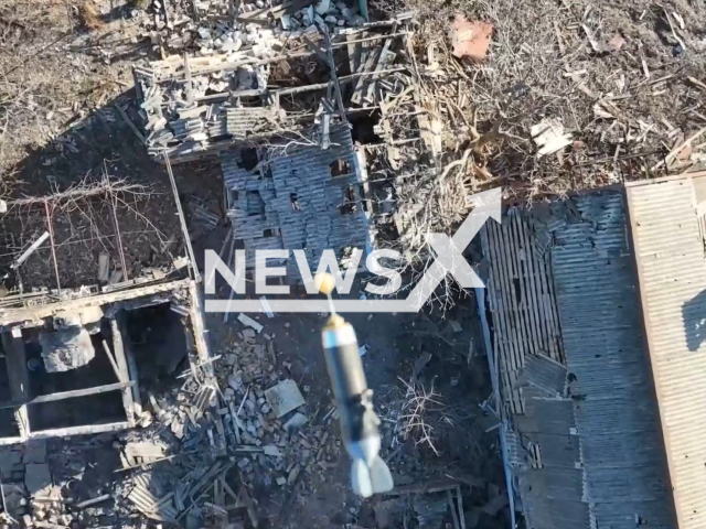 Bomb falls at Russian soldiers hiding in a damaged building in Bakhmut, Donetsk region, Ukraine in undated photo. The footage was released by the Khartiia voluntary unit on Thursday, Jan. 12, 2023. Note: Picture is a screenshot from a video (@khartiia/Newsflash)